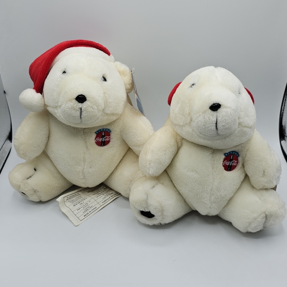 Coca-cola Bears - one with Ear Muffs and one with Hat